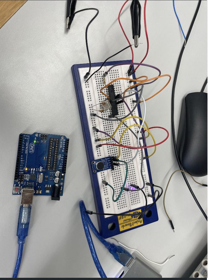 Touchless light switch breadboard with Arduino Uno and sensor module