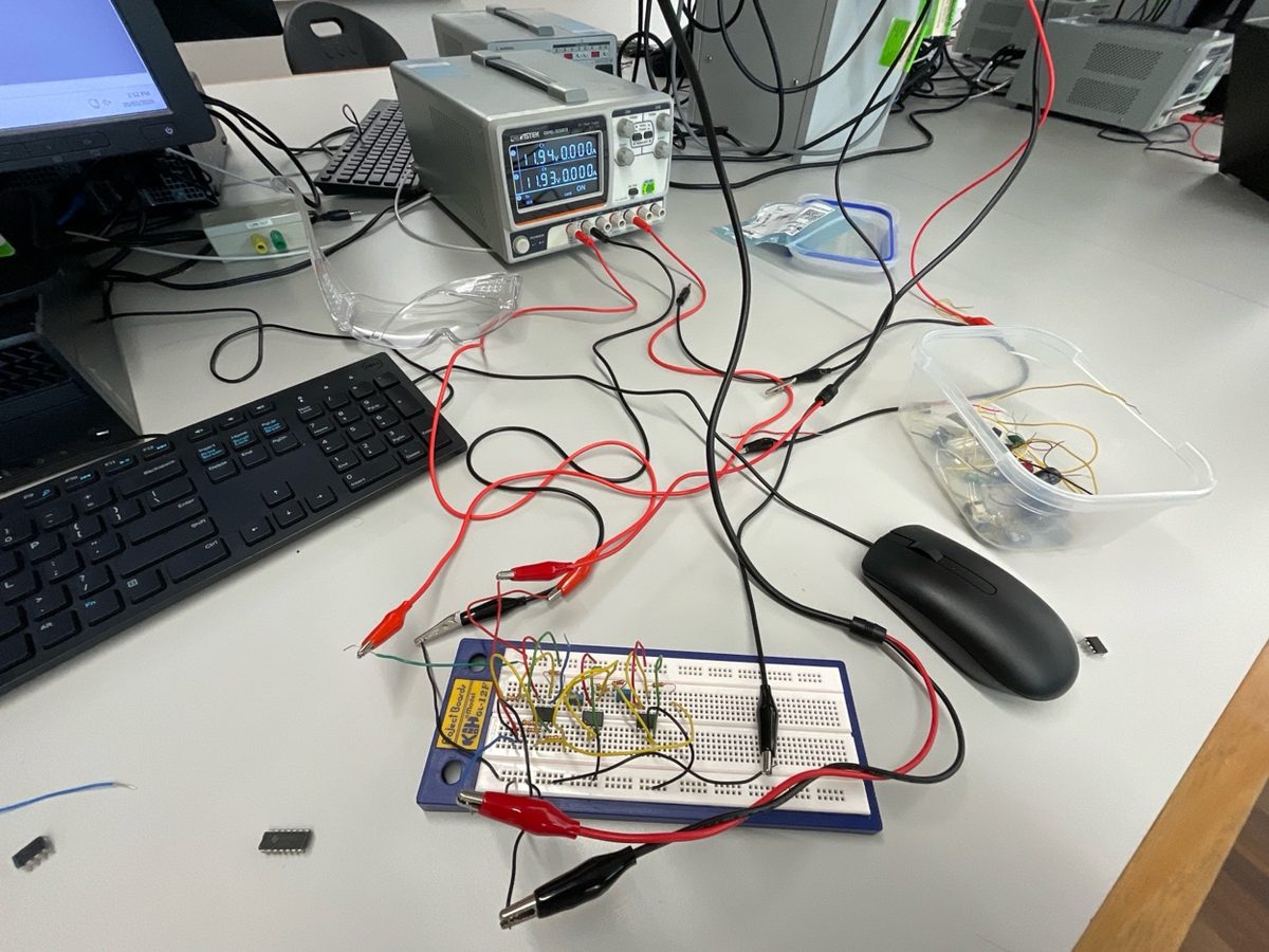 Analog active filter breadboard being tested on a lab bench